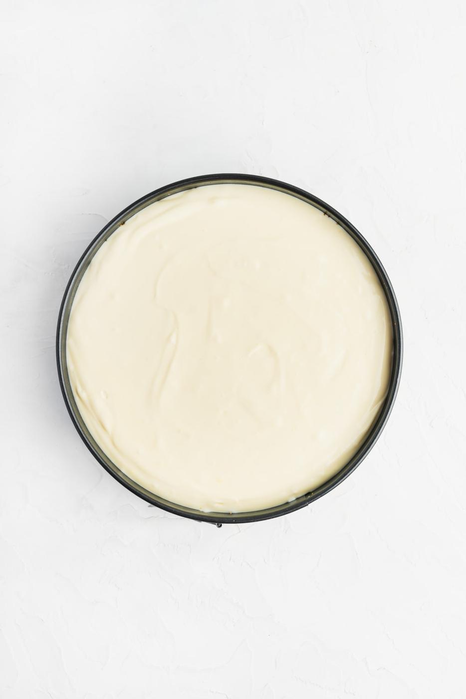 cheesecake batter in springform pan before baking