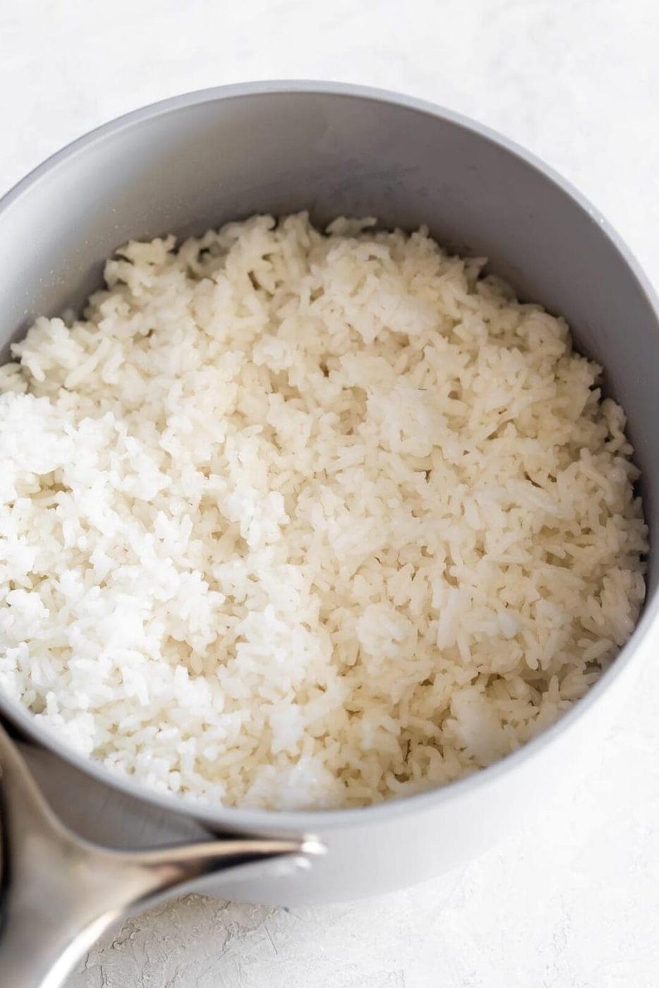 cooked white rice in a saucepan