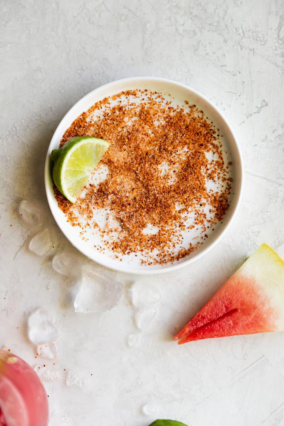 Spicy Tequila Watermelon Punch. Fresh cubed watermelon blended with tequila, lime juice, and sliced jalapeños in chili salt rimmed glasses. Refreshing drink for a hot day!