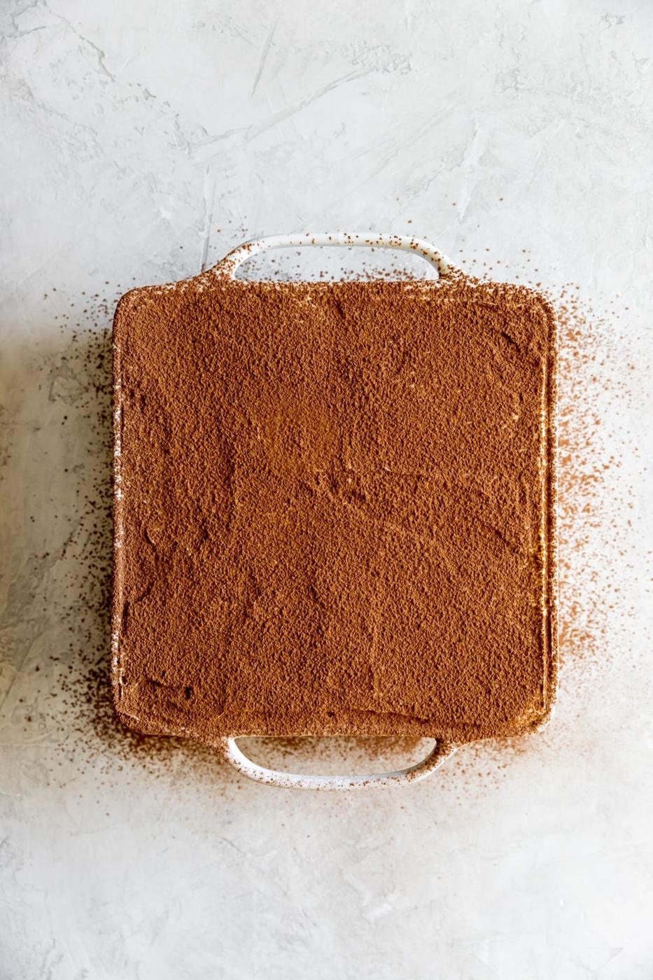 cocoa dusted over the tiramisu before serving