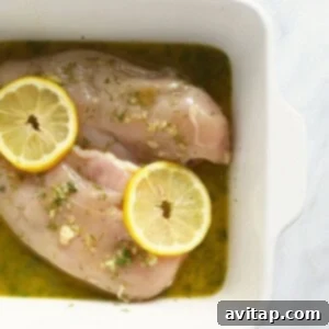 marinated chicken breast in dish.
