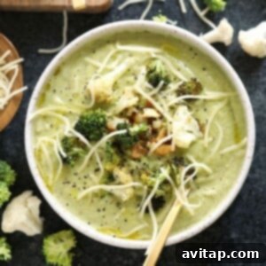 A lightened up bowl of broccoli soup with parmesan cheese.