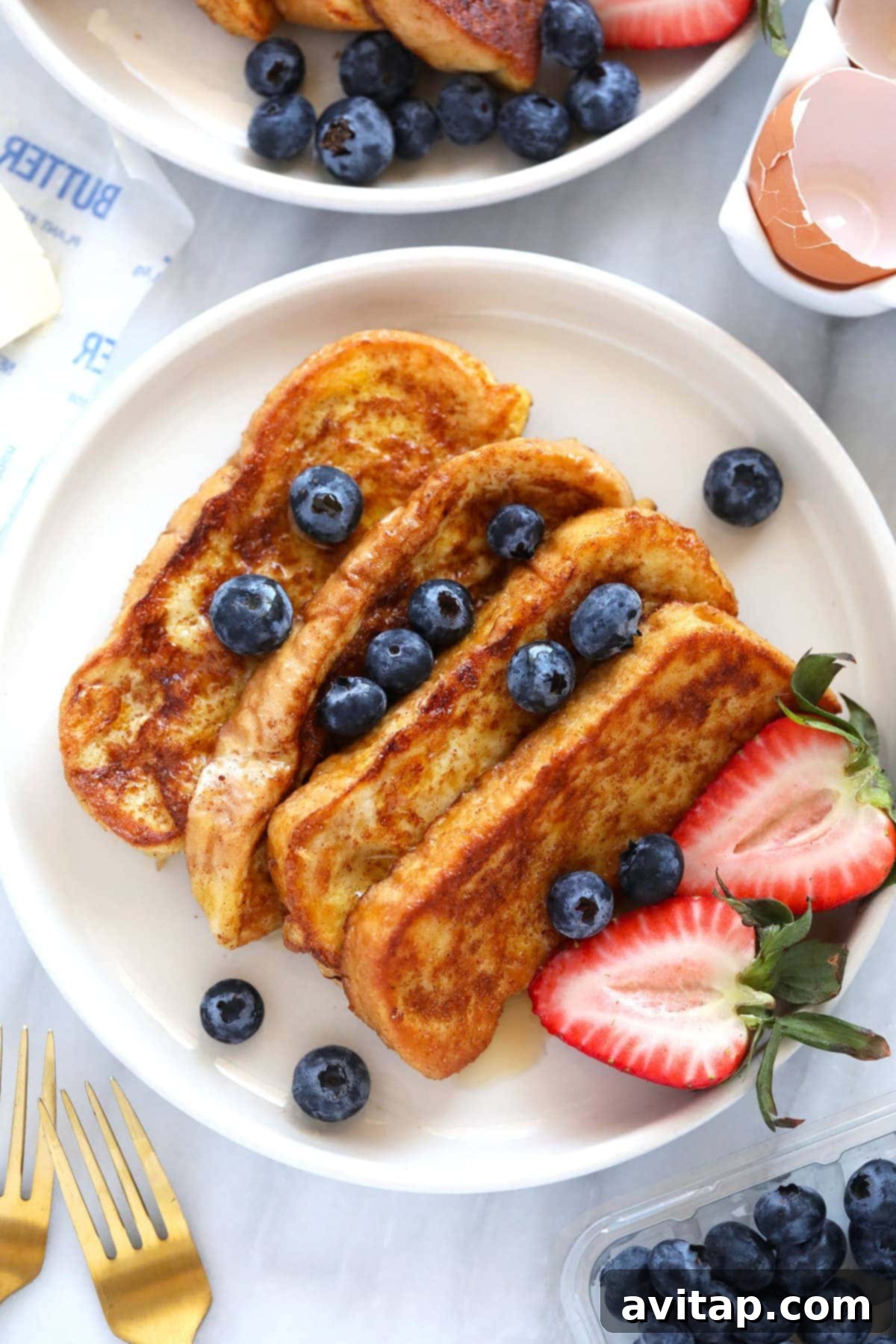 Homemade French Toast Sticks with Cinnamon Sugar Delicious French Toast Sticks topped with cinnamon sugar, a perfect childhood classic breakfast.