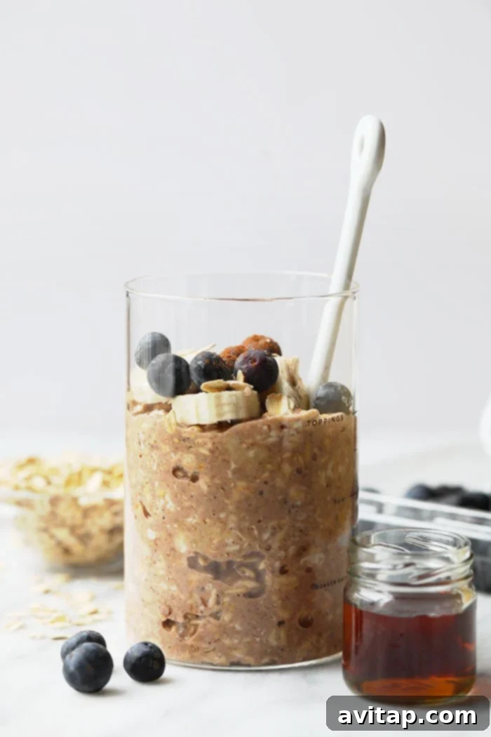 Maple French Toast Overnight Oats in a Jar, topped with fresh berries
