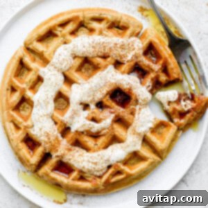 Cinnamon Swirl Waffles 7 cinnamon roll waffle on a plate