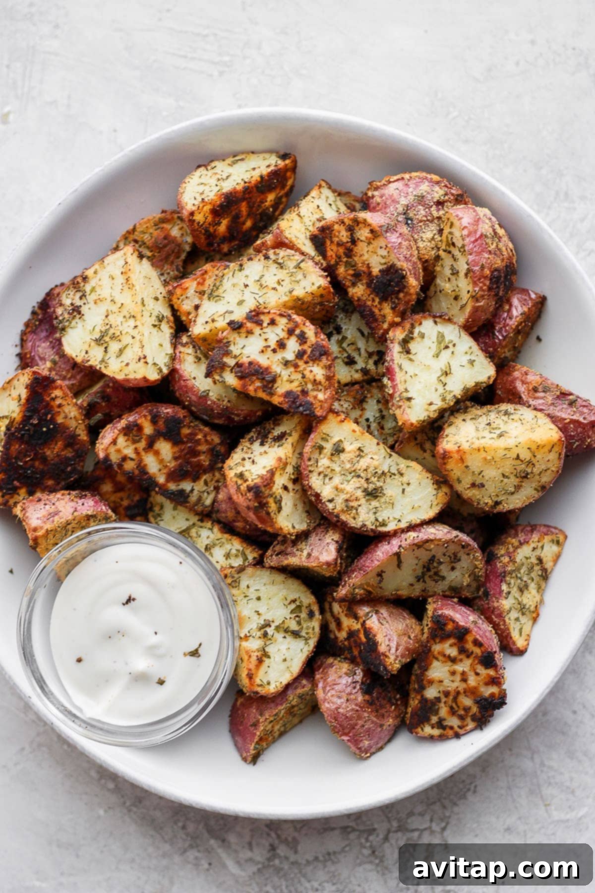 Deliciously crispy Ranch Roasted Potatoes Ranch roasted potatoes in a bowl ready to be served