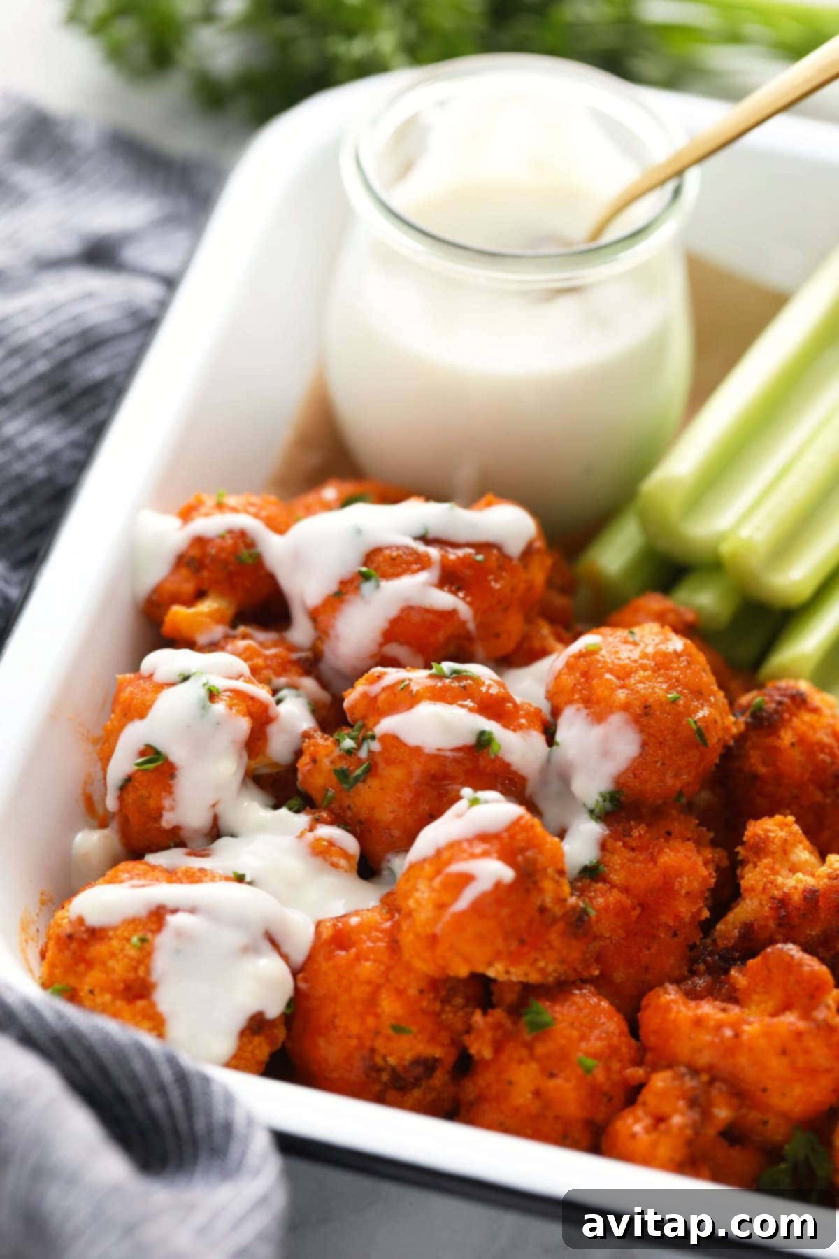 Seriously the best air fryer cauliflower wings made with a delicious homemade buffalo sauce. They're crunchy and the perfect appetizer!
