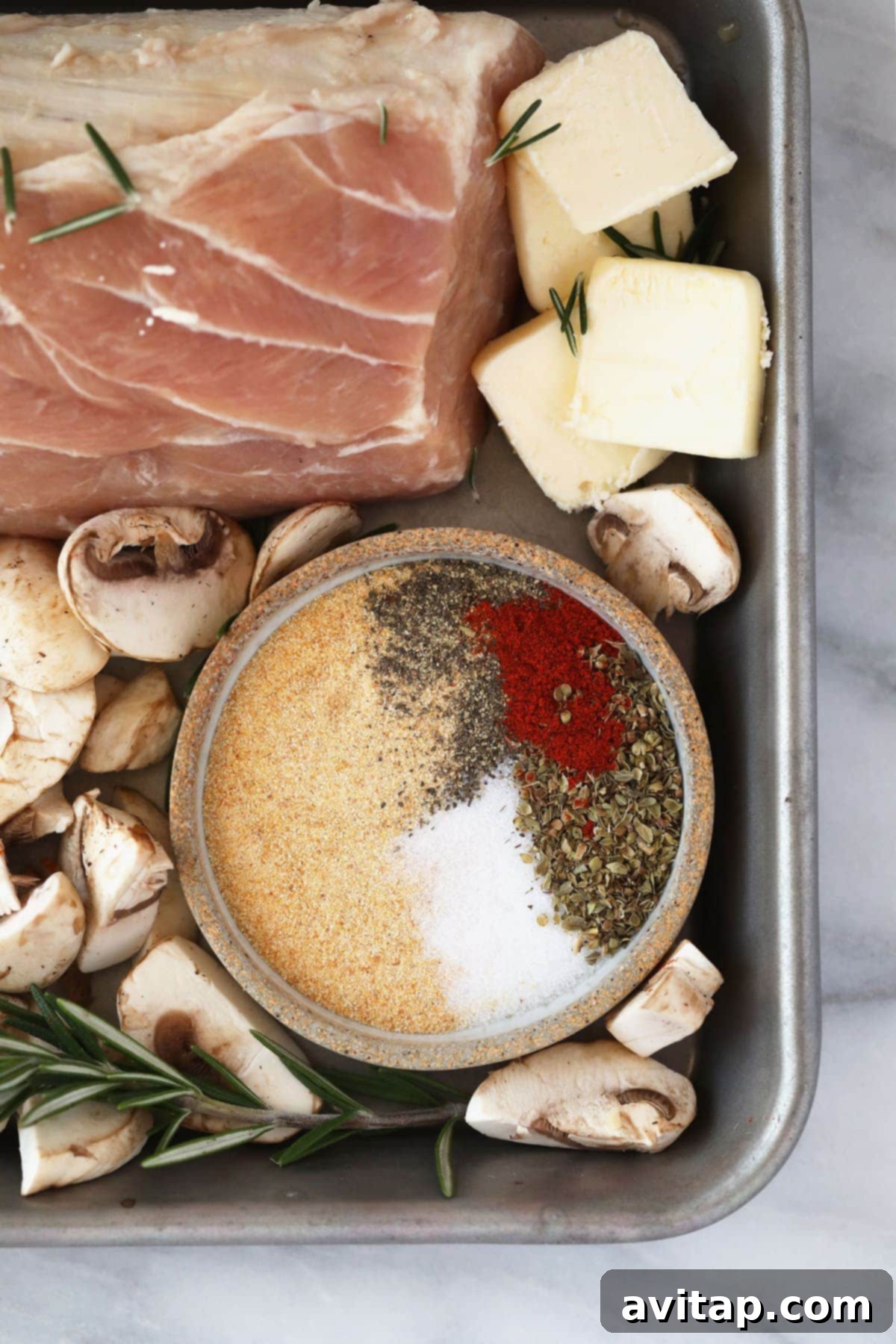 A bowl of spices for pork dry rub.