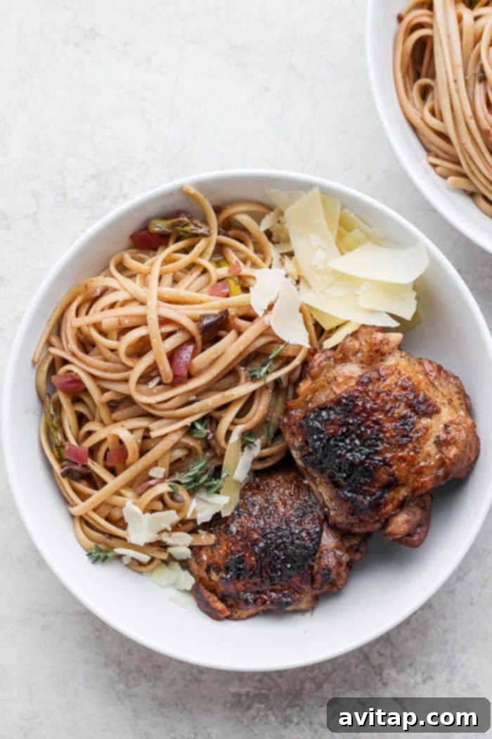 Oven-Fried Crispy Thighs 15 A plate of roasted balsamic chicken pasta with cherry tomatoes and fresh basil.