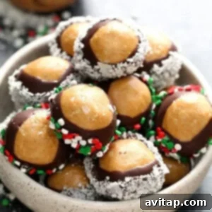 Healthy chocolate covered peanut butter balls, a close-up.