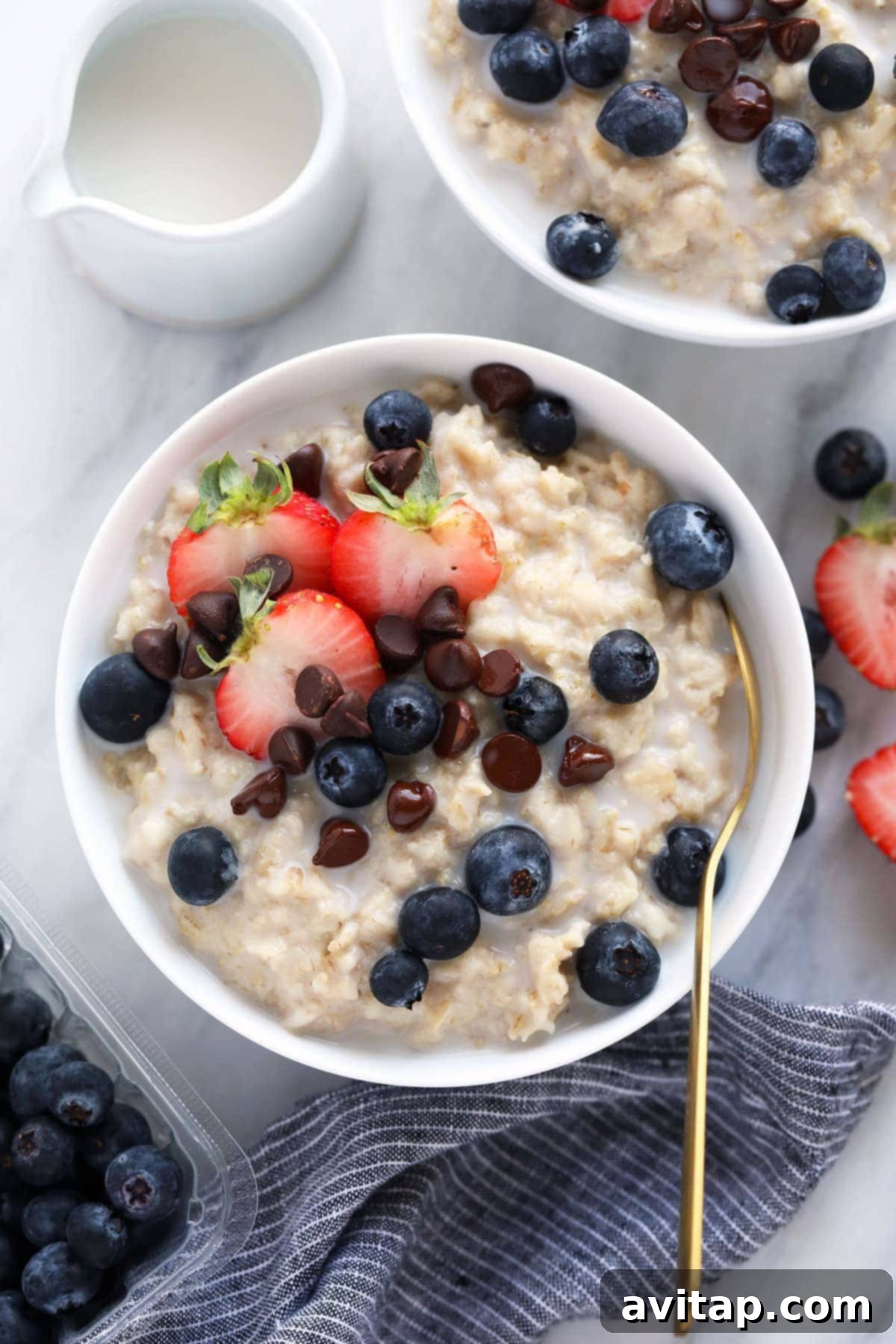 Easy Instant Pot Oatmeal made with old fashioned oats instead of steel cut made in less than half the time! A simple bowl of Instant Pot oatmeal, ready to be customized with toppings.
