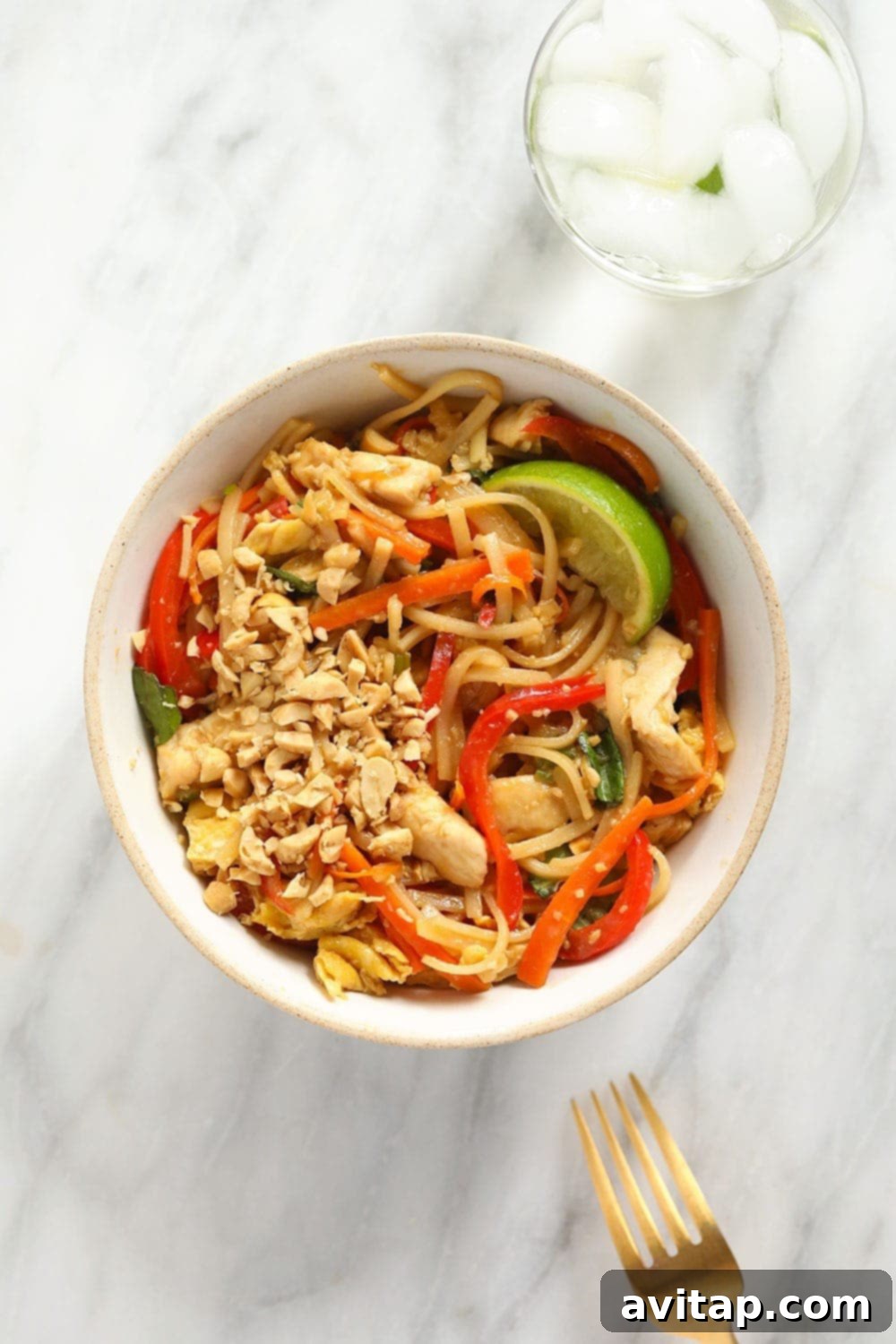 A bowl of delicious chicken pad Thai, a quick and flavorful takeout alternative.