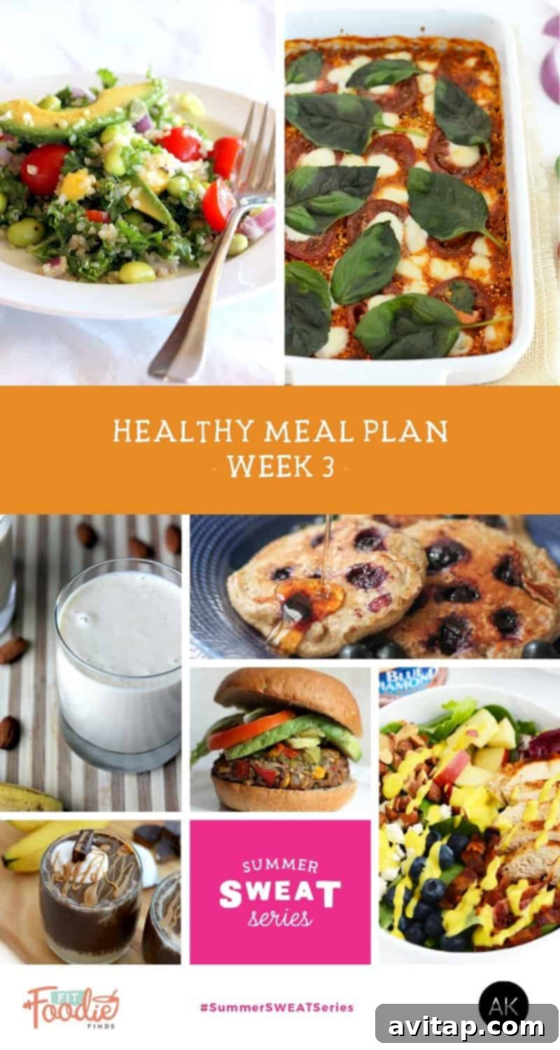 A vibrant and appetizing meal spread, featuring healthy and delicious dishes from Ambitious Kitchen's nutrition plan. The food includes fresh vegetables, lean protein, and whole grains, symbolizing a balanced diet. The image reinforces the importance of nutrition alongside fitness in the Summer SWEAT Series for a holistic wellness approach.