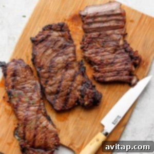 Steak on cutting board.