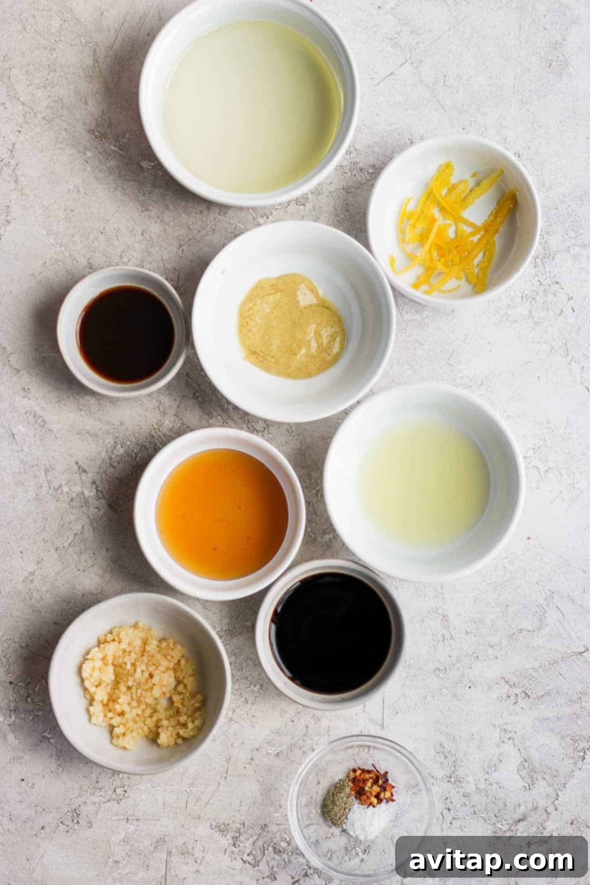 Close-up of fresh marinade ingredients laid out on a kitchen counter, ready for mixing.