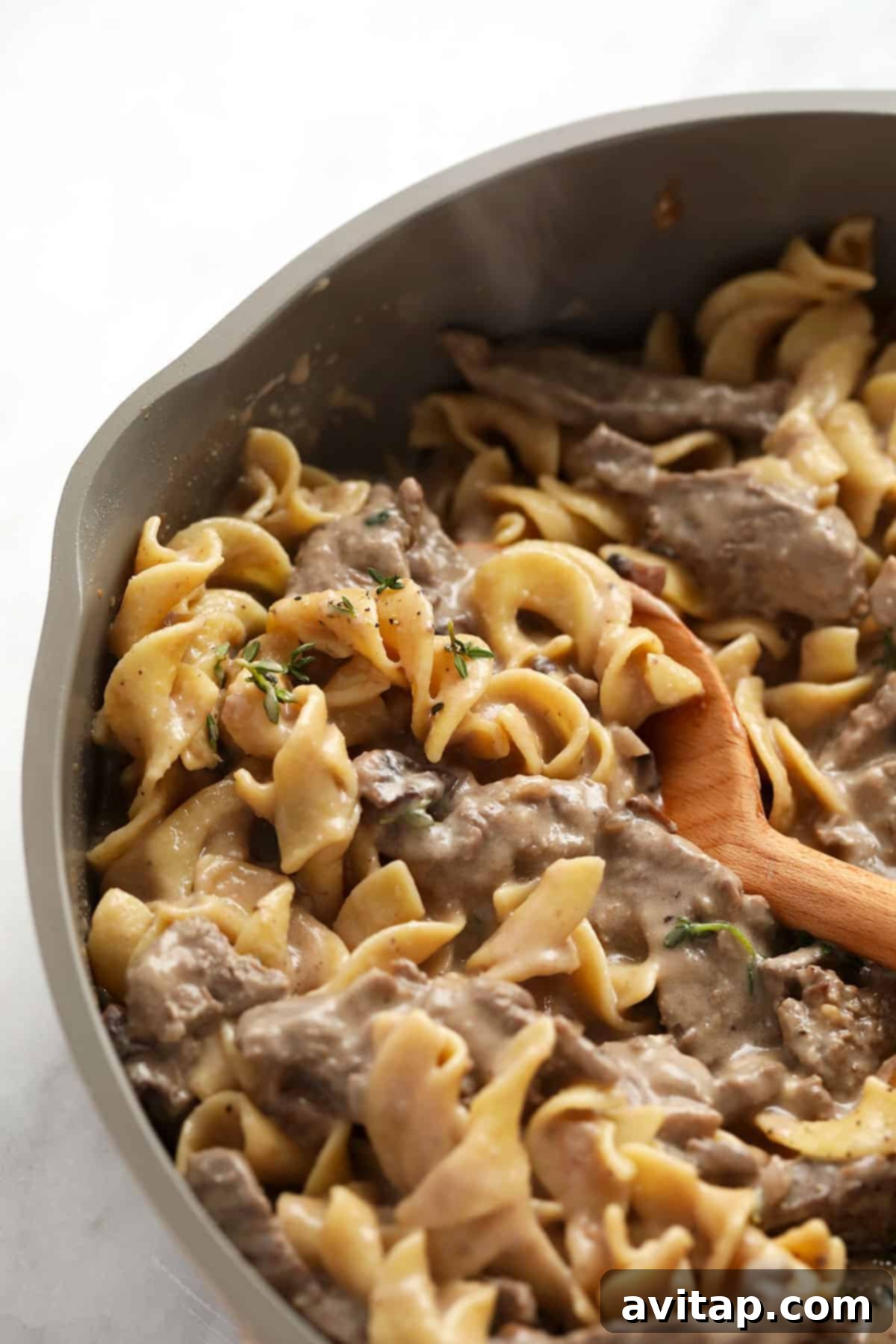 Effortless Creamy Beef Stroganoff 7 A pan full of rich, creamy beef stroganoff, showcasing the perfectly incorporated ingredients.