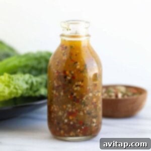 Zesty Homemade Italian Dressing 6 Italian dressing in glass bottle.
