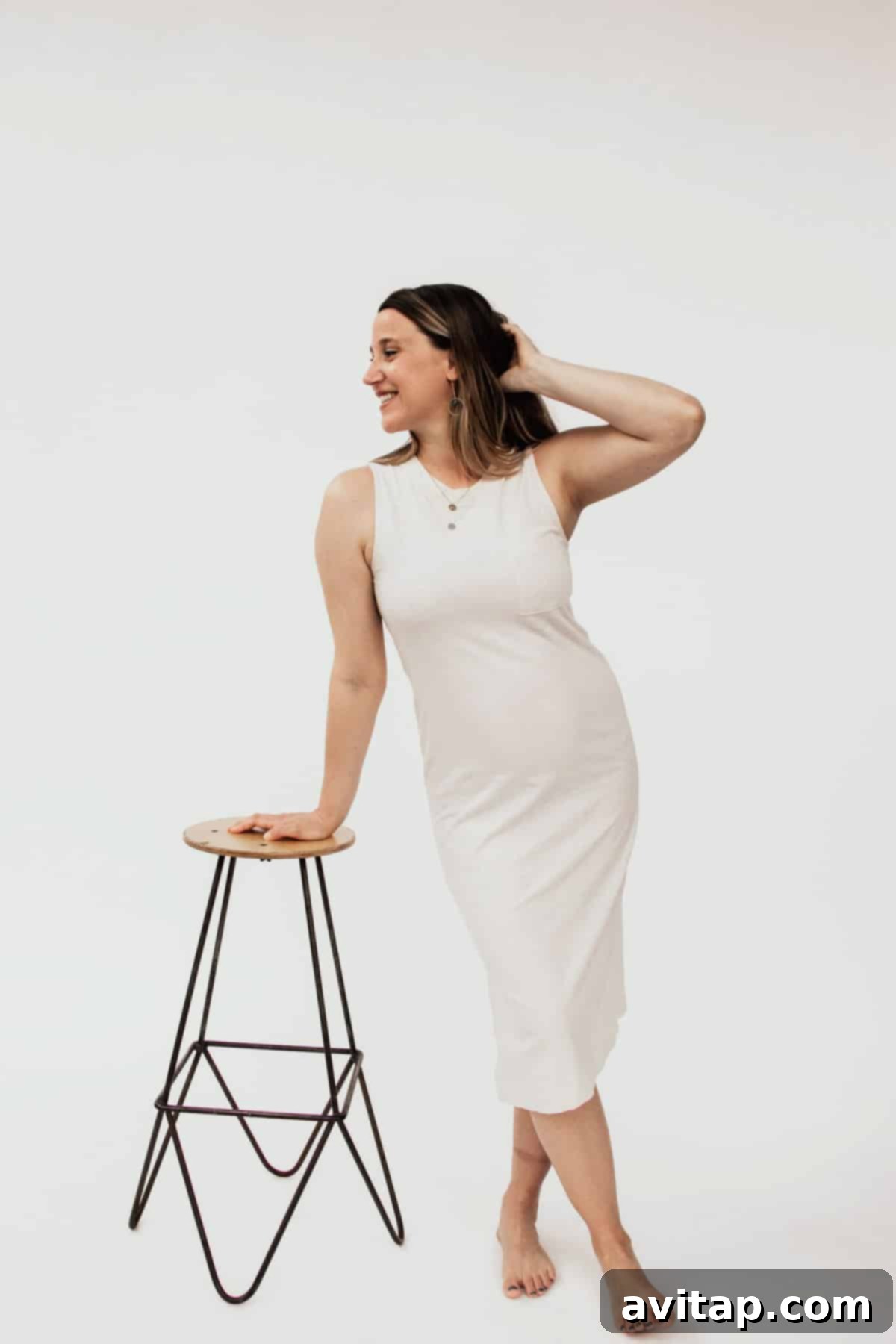 Emily Richter wearing multiple necklaces designed by Larissa Loden as part of The Femme Collection, layered elegantly to showcase their versatility.