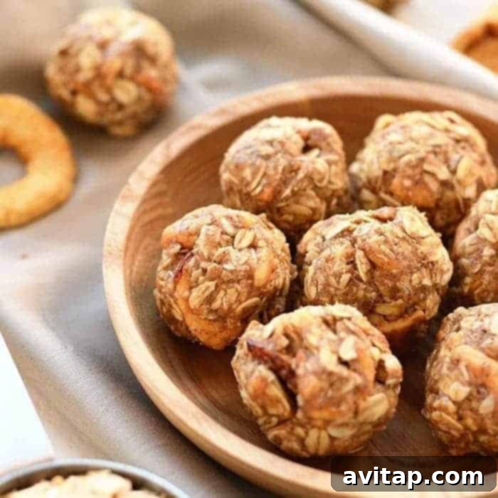 Delicious Apple Chai Energy Balls arranged neatly in a decorative bowl, highlighting their wholesome texture and inviting appearance, perfect as a healthy fall snack.