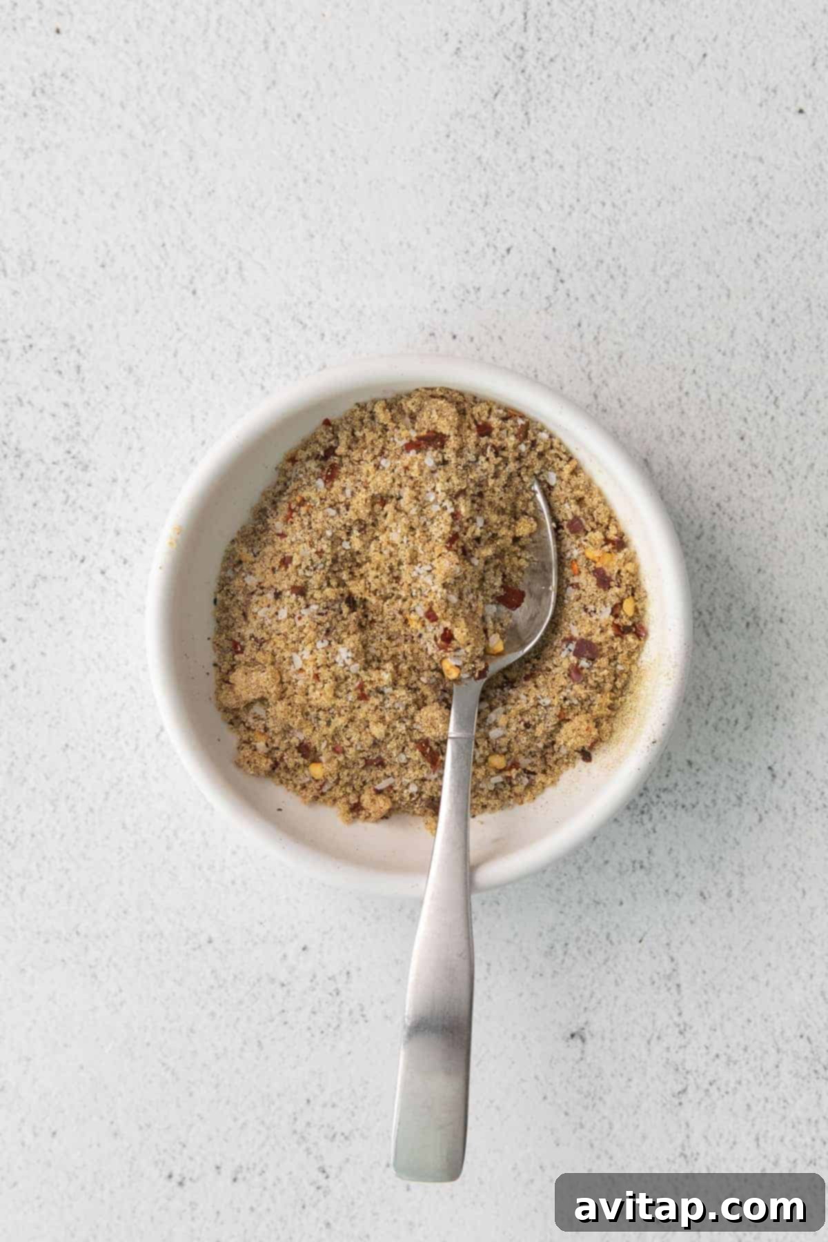 Dry rub for pepper steak in a bowl.