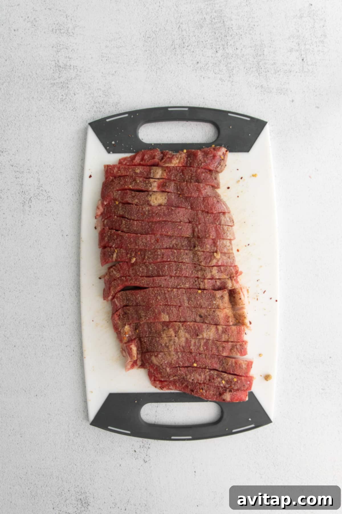 Pepper steak sliced into thin strips.
