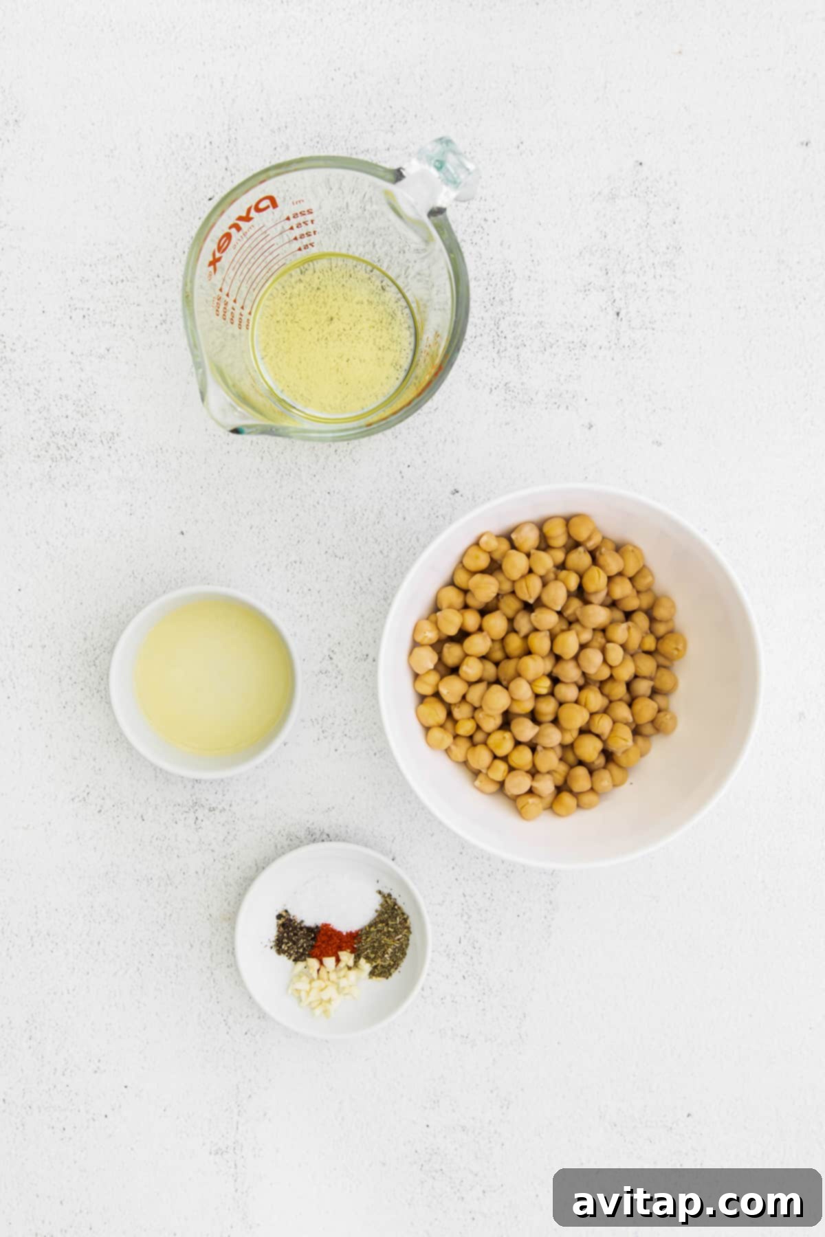 Seasoned chickpeas in a small bowl, ready for the Mediterranean couscous salad