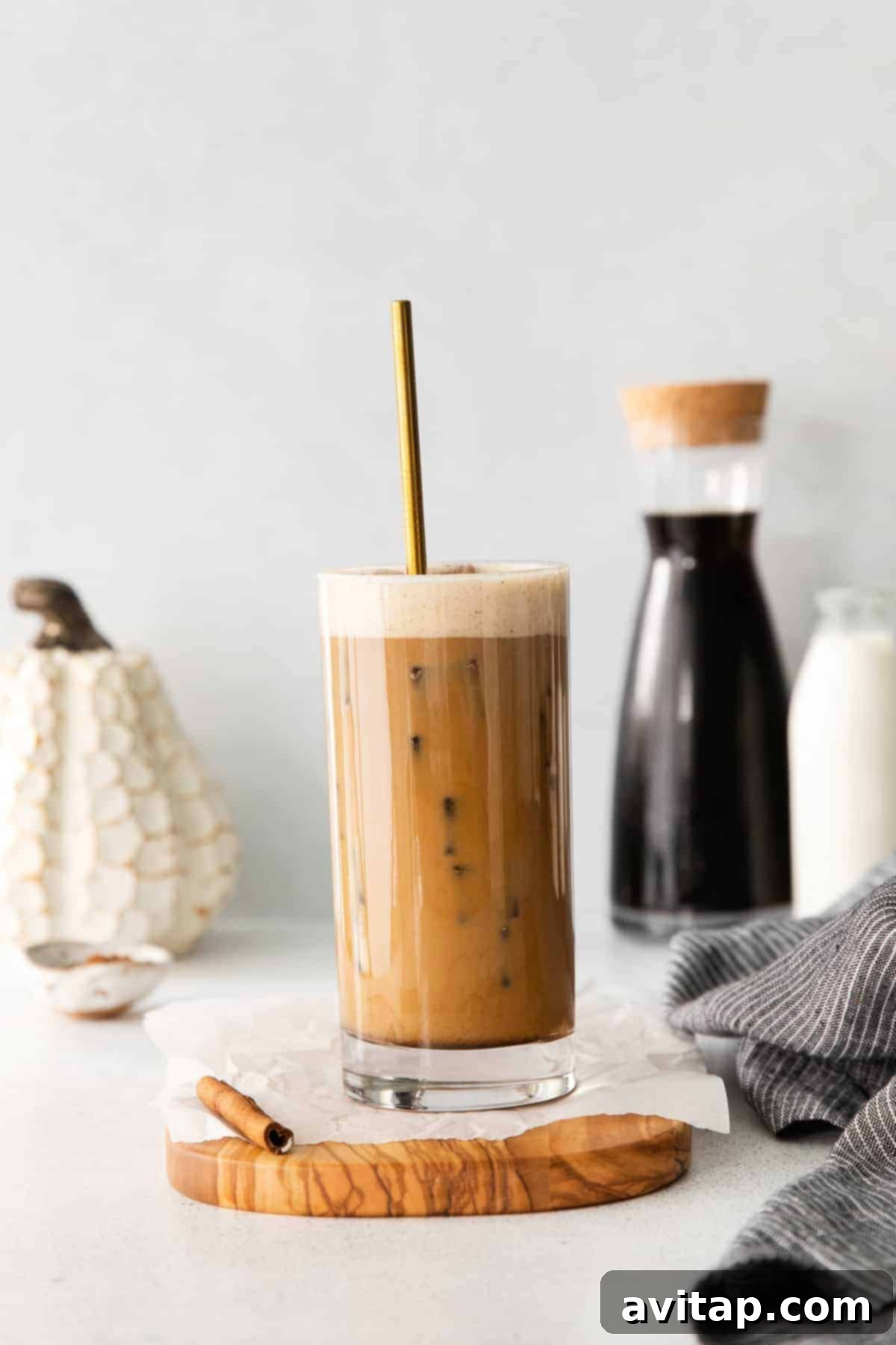 Velvet Pumpkin Cold Brew 2 Tall glass of homemade Pumpkin Cream Cold Brew, with creamy pumpkin foam swirled into the dark cold brew.