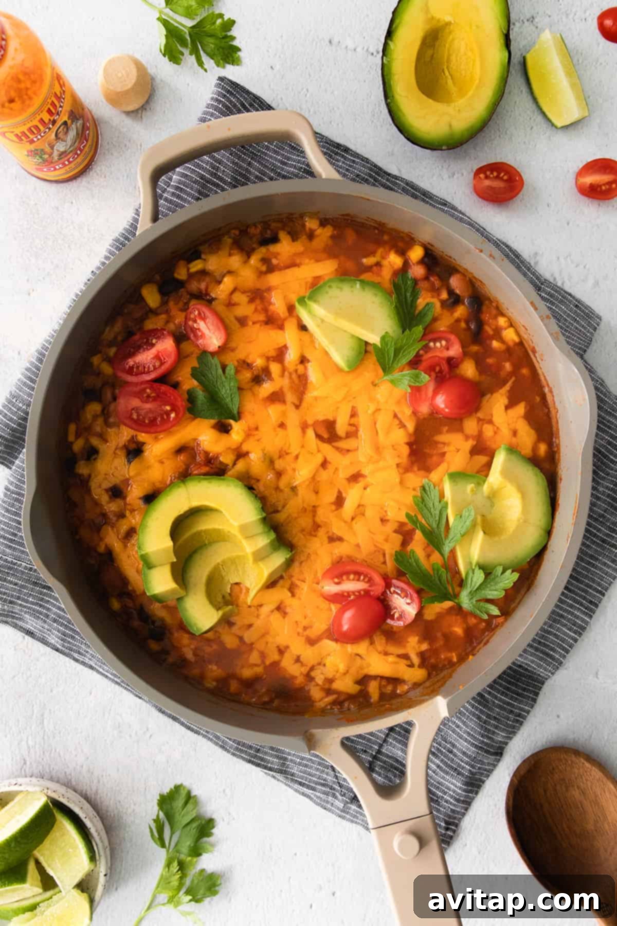 A top-down view of the cauliflower taco skillet, garnished with fresh herbs, showcasing its vibrant appeal.