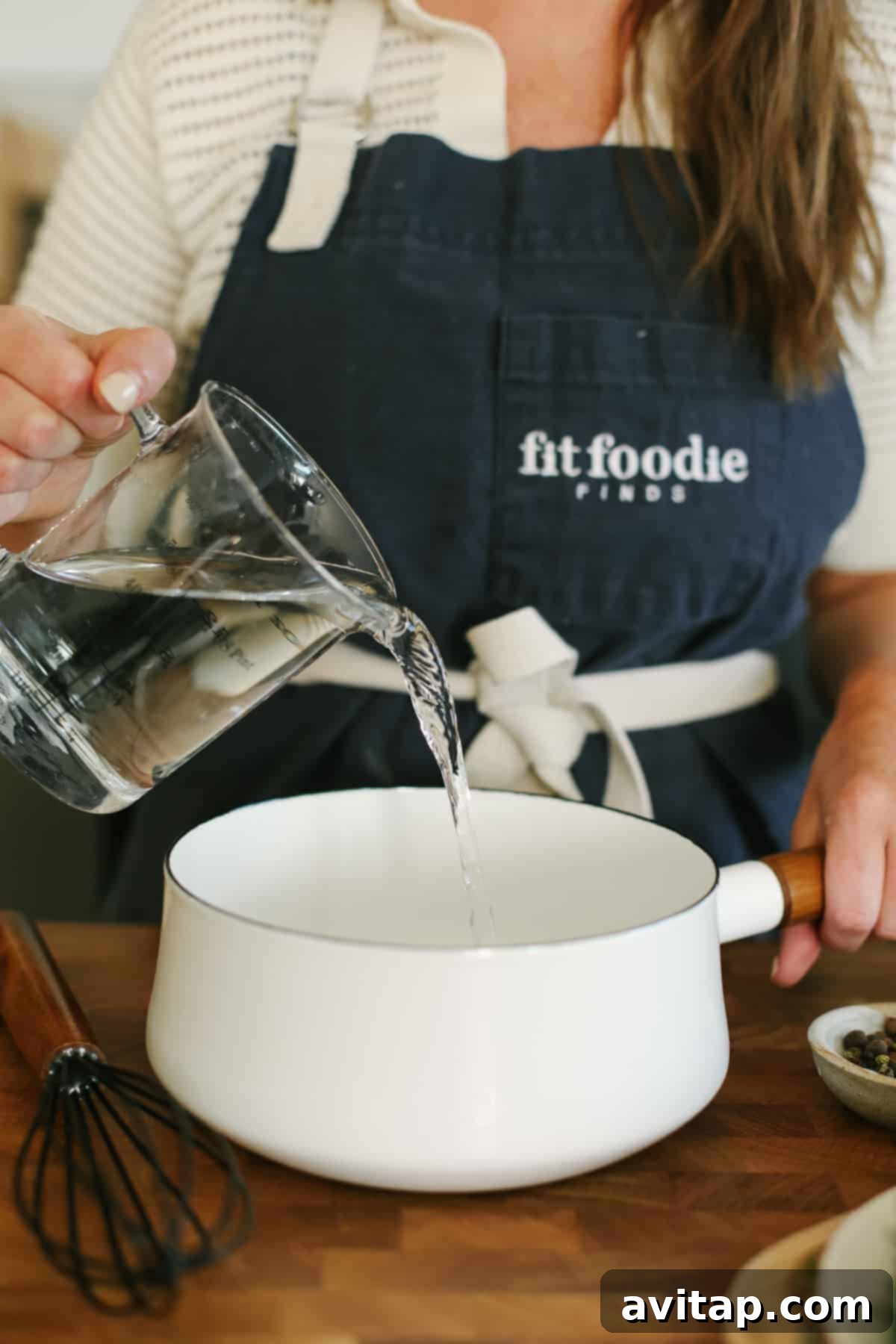 The Ultimate Smoked Turkey Brine 5 Adding water and salt to a small saucepan.