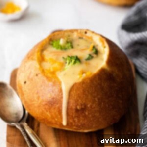 close up of broccoli cheddar soup in a bowl
