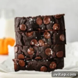 A stack of delicious chocolate pumpkin bread.