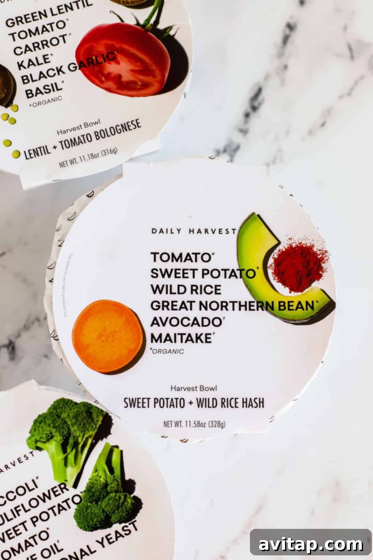 Daily Harvest harvest bowls in their convenient packaging, ready for cooking