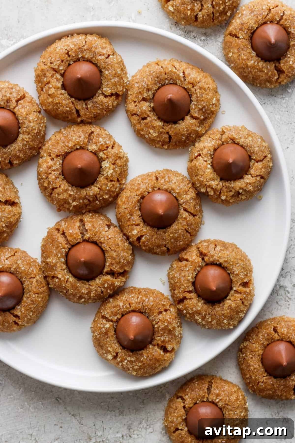 Ultimate Flourless Peanut Butter Blossoms 6 Freshly baked flourless peanut butter blossoms cooling on a rack, showcasing their perfect shape.