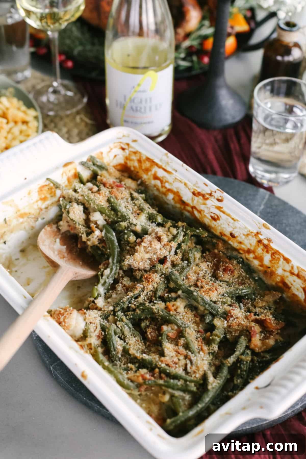 Irresistible Bacon Green Bean Casserole A bubbling green bean casserole with crispy bacon topping, served fresh from the oven in a classic casserole dish.