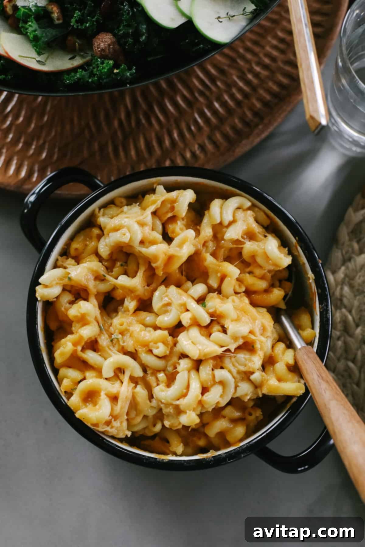 Decadent Smoked Mac and Cheese A golden-brown smoked mac and cheese in a rustic casserole dish, perfectly baked and ready to be served.