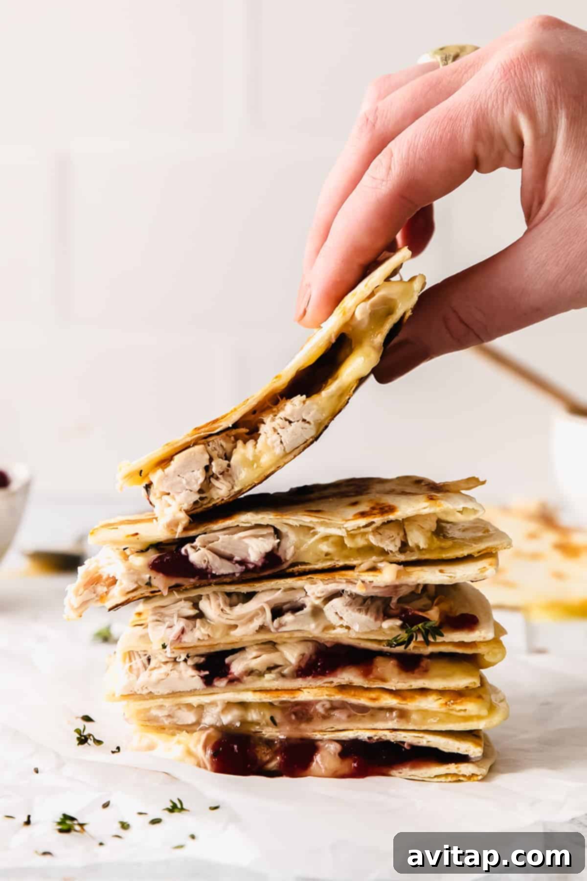 leftover thanksgiving turkey quesadilla stacked 4 slices high