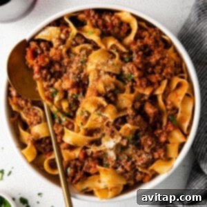 Slow cooker bolognese sauce, a delicious and rich meat sauce ready to be served over pasta.