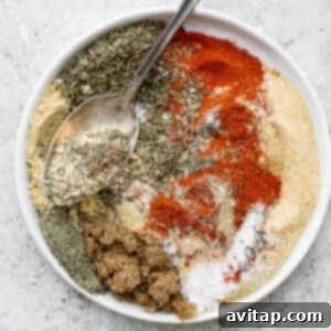 A small bowl filled with homemade salmon seasoning, ready for use.