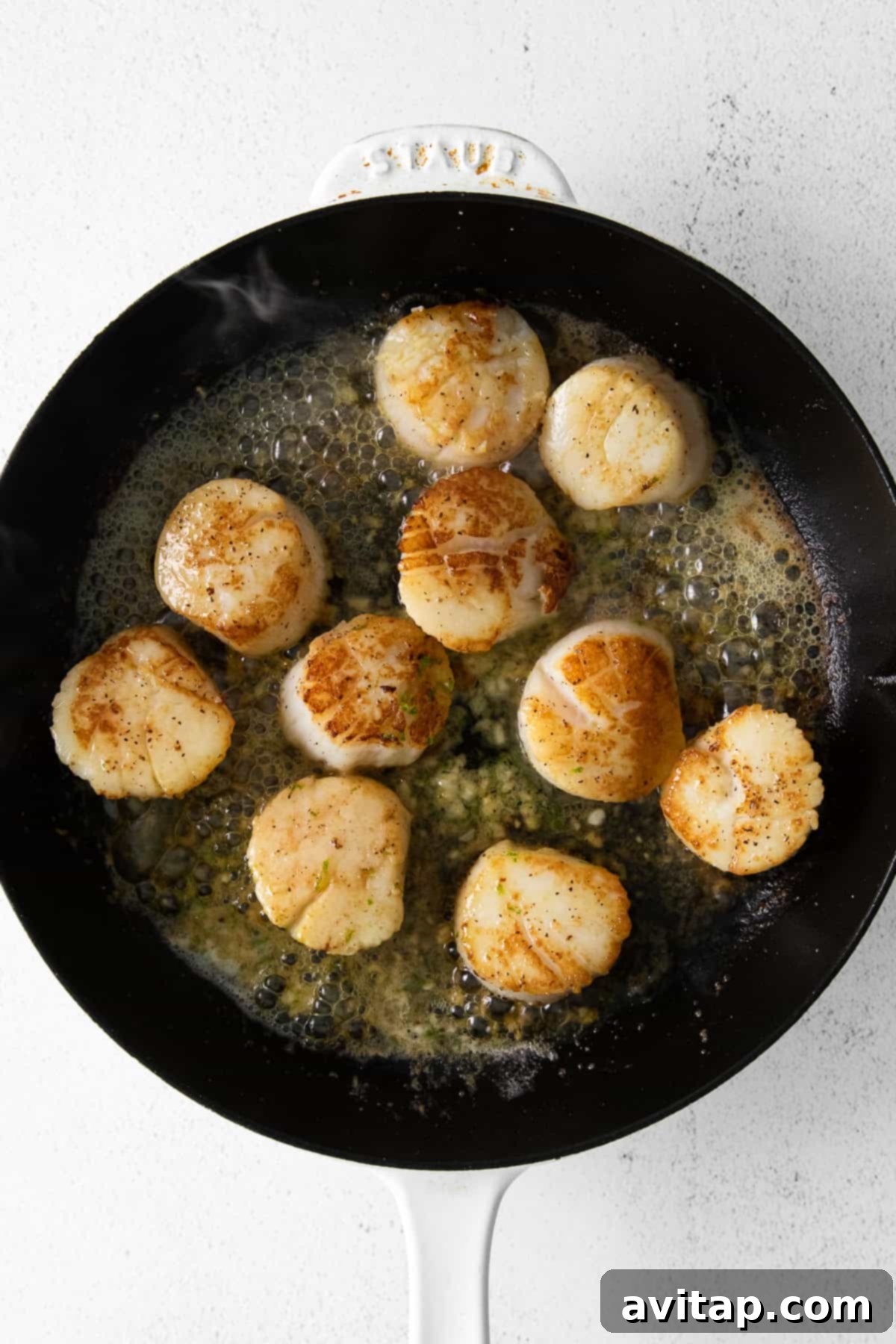 Pan seared scallops in a little butter and lime juice, finished in the pan. 