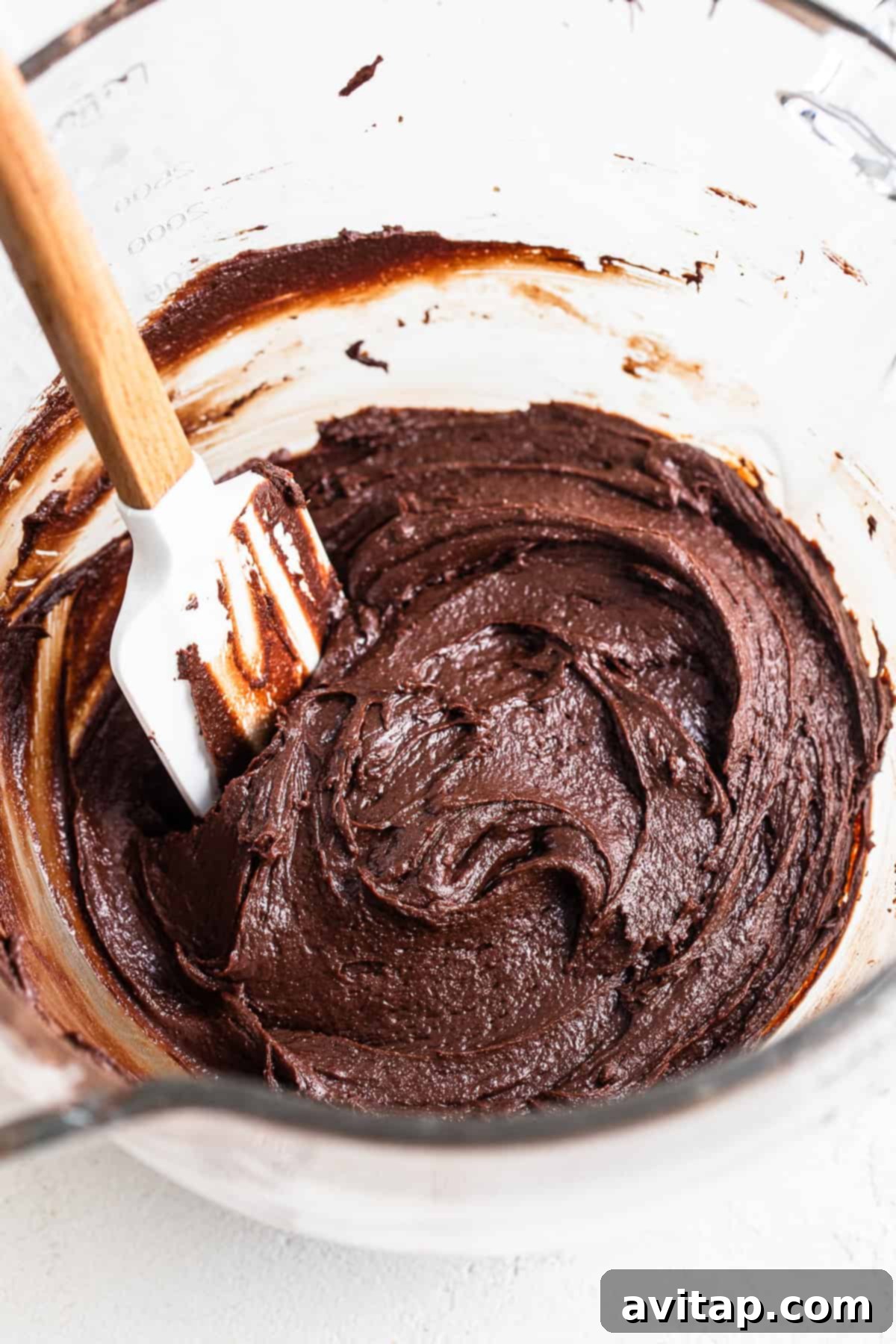 Preparing delicious Thin Mint brownie batter in a mixing bowl