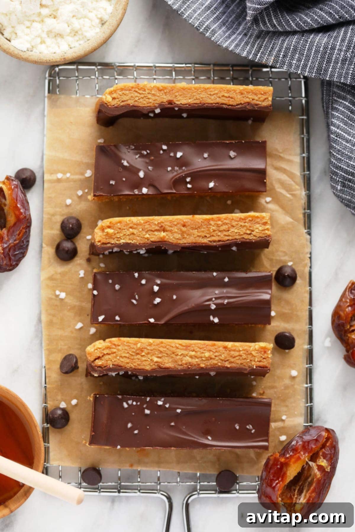 Delicious homemade peanut butter protein bars cooling on a wire rack.