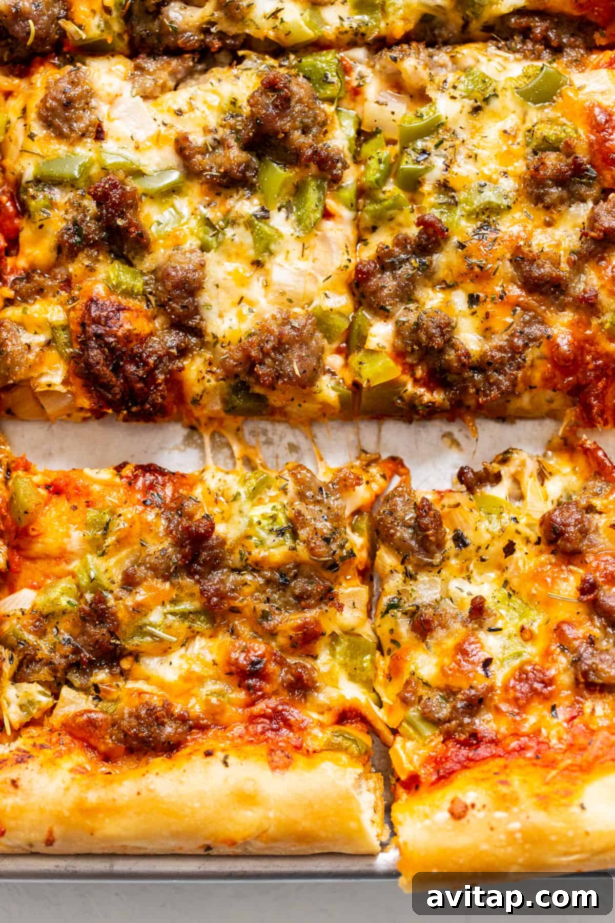 Baked Homemade Pizza Ready to Serve A whole, glorious homemade pizza on a baking sheet, featuring a perfectly golden-brown crust and mouth-watering toppings, ready for slicing and serving.