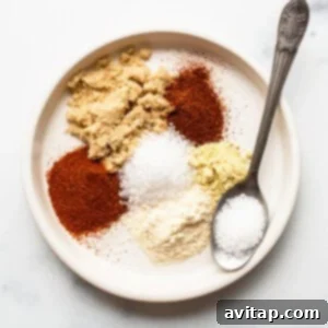 Dried spices on a plate, ready for seasoning the salmon.
