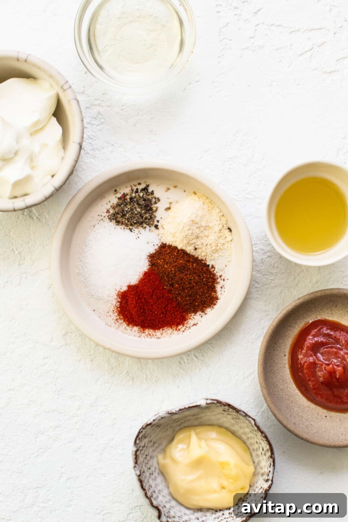 Ingredients for easy burger sauce in bowls.