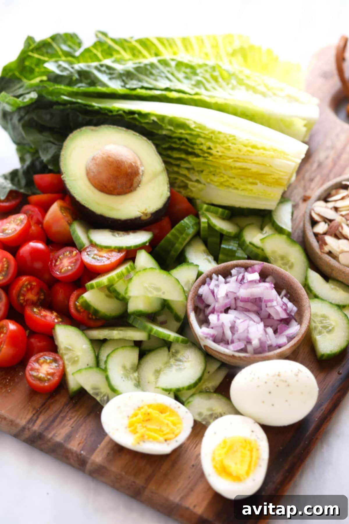 lettuce and veggies on cutting board