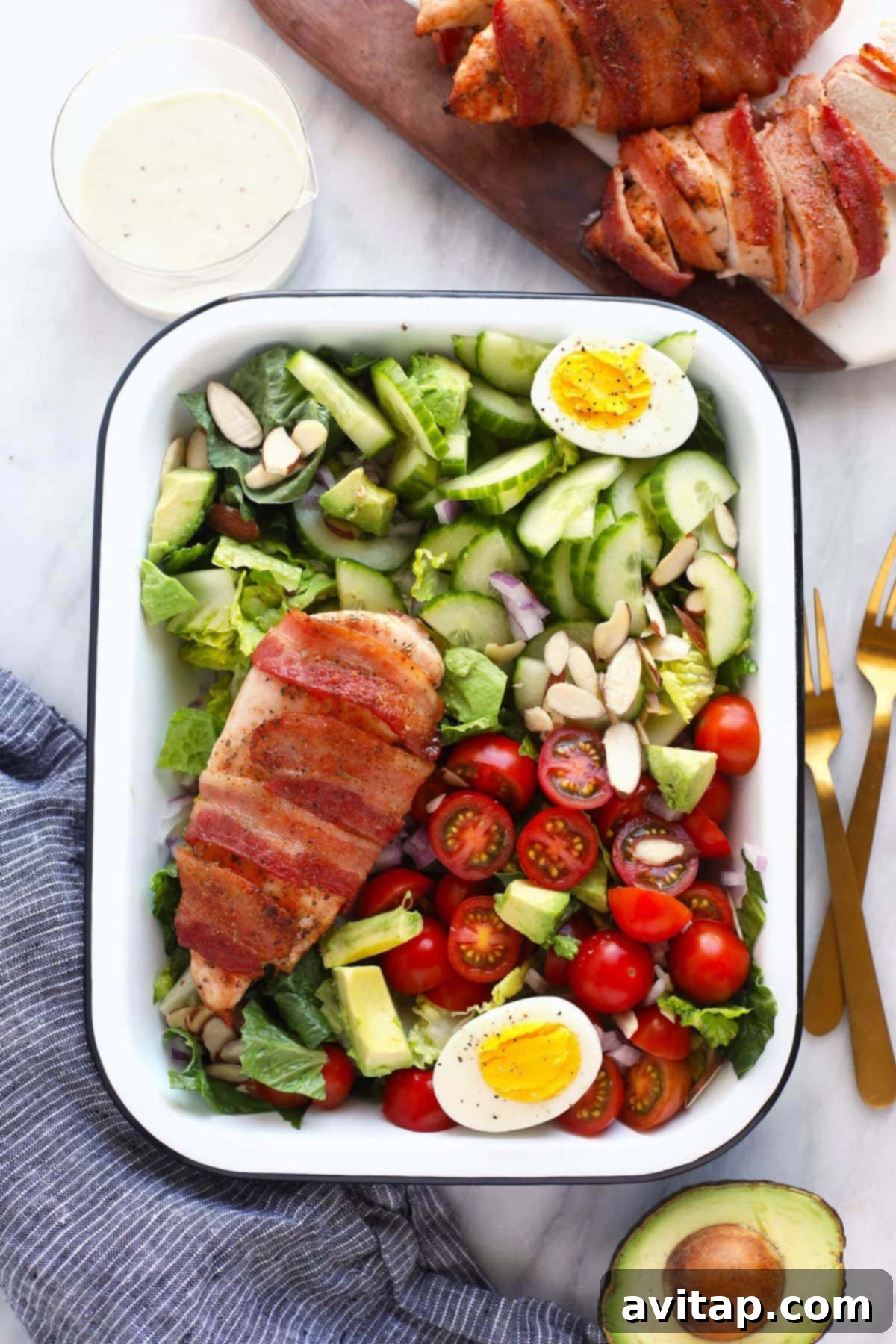 chicken salad in dish with 2 forks
