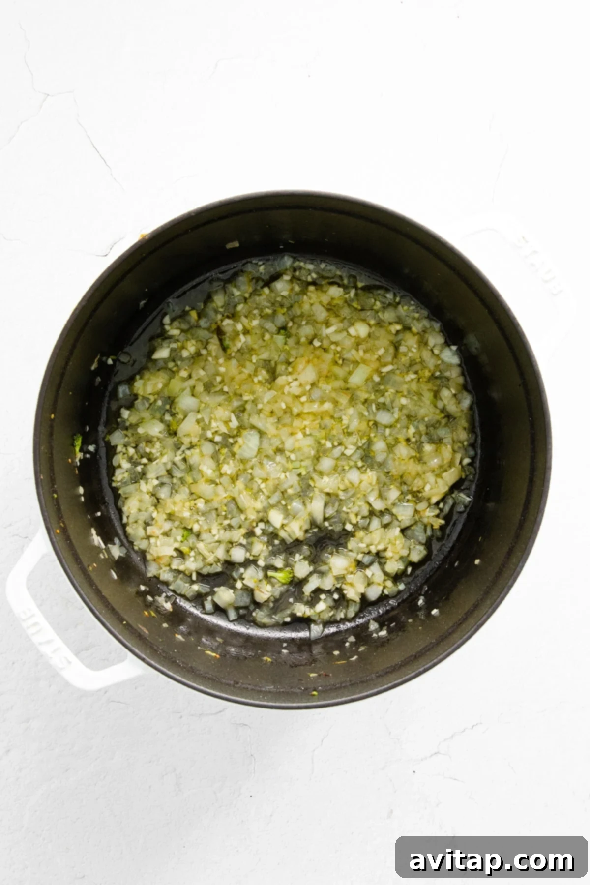 sauteed onions and garlic in a stock pot