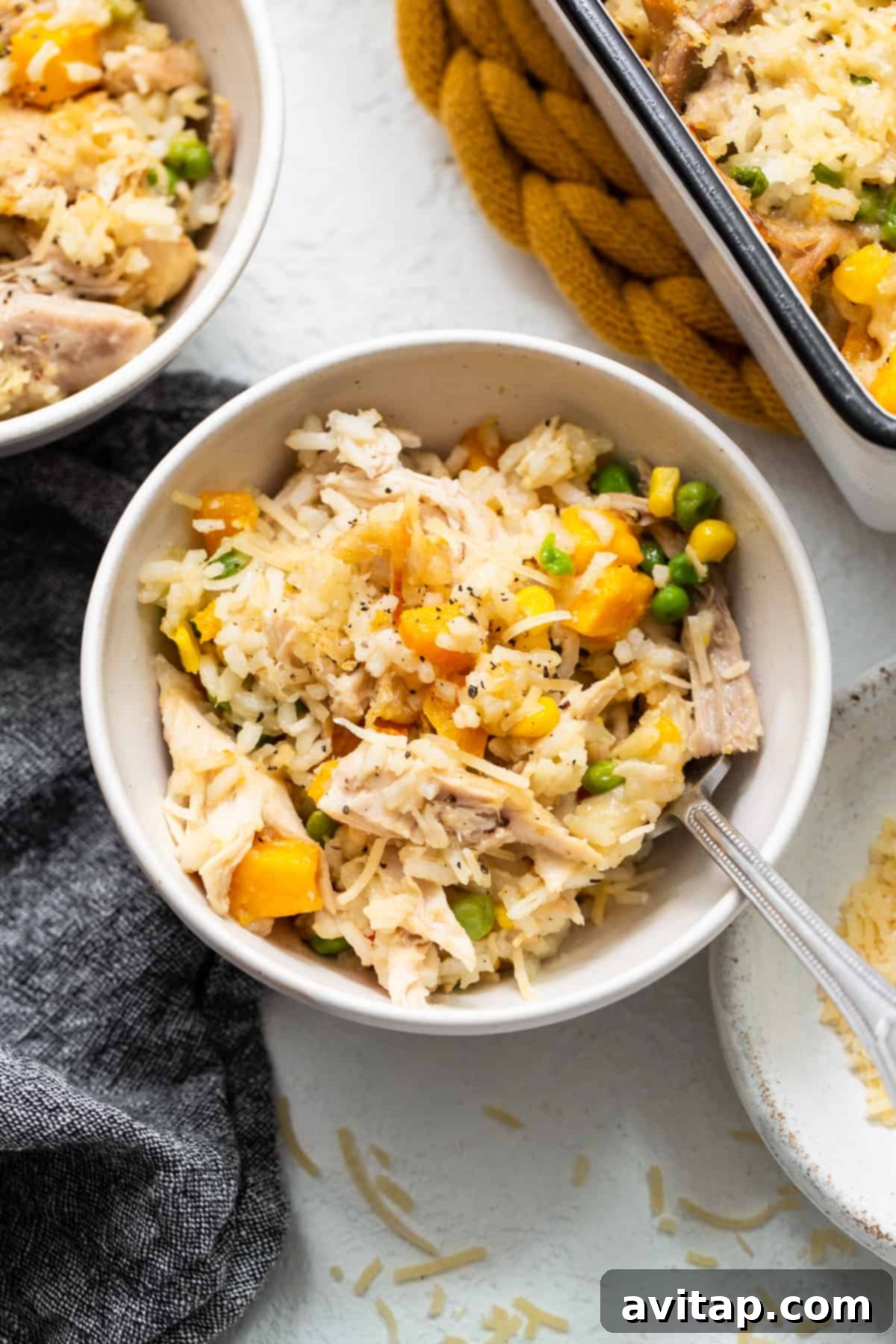 A hearty bowl of creamy turkey casserole, garnished and ready to be enjoyed.