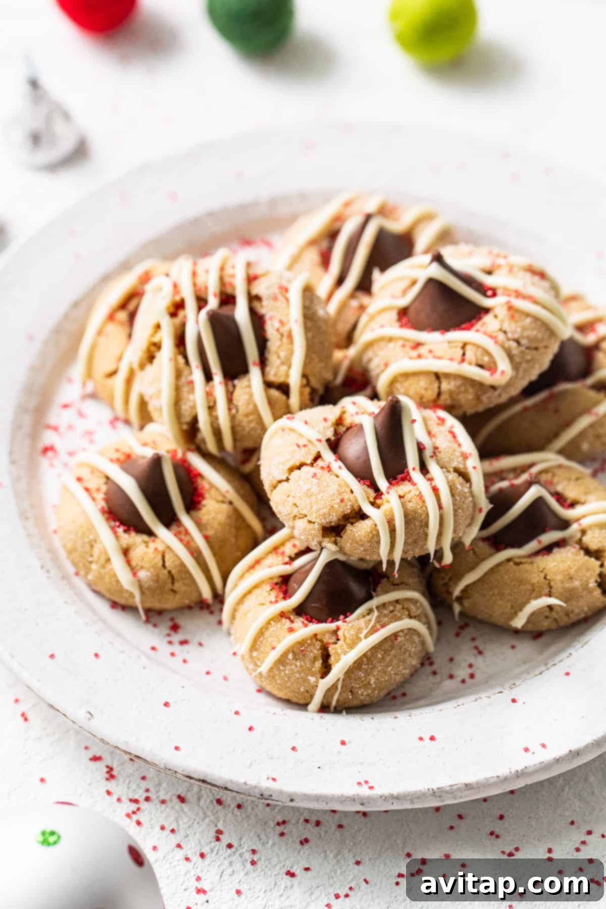 Sweet Perfection: Stack of Peanut Butter Kiss Cookies A beautifully arranged stack of peanut butter kiss cookies, showcasing their perfect texture and chocolate tops.