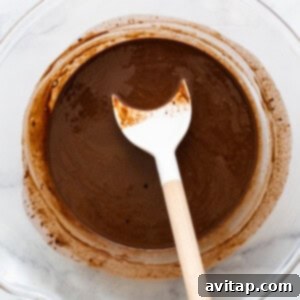 No-Bake Peppermint Fudge 11 Melted freezer fudge ingredients in a bowl.